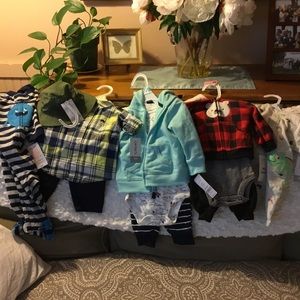 New with tags LOT baby carters baby cloths.